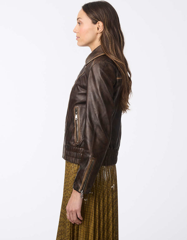 distressed brown leather bomber jacket perfect for pairing with jeans and a shirt for an effortless casual style