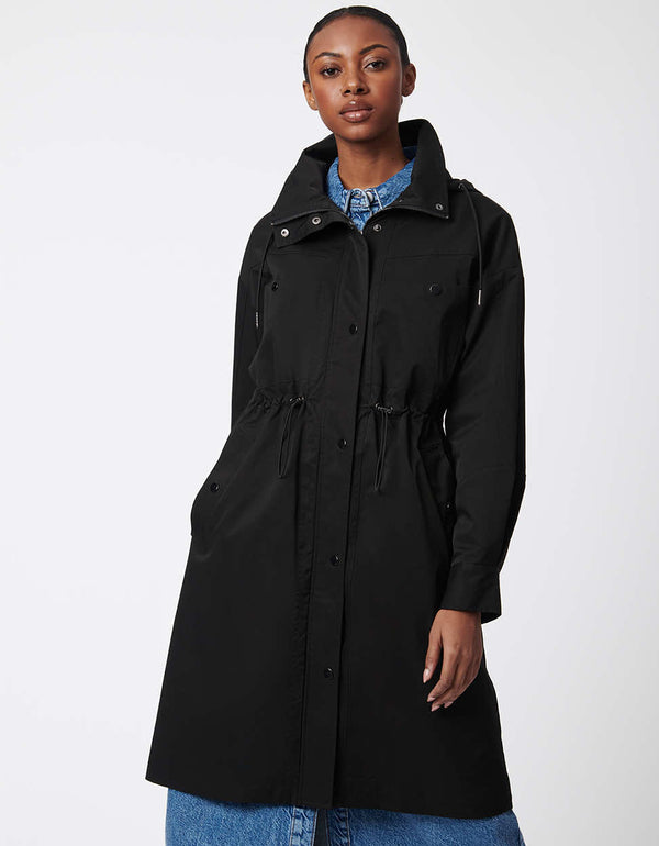 modern take on the knee length black polyester trench rain coat for women with drawstring details