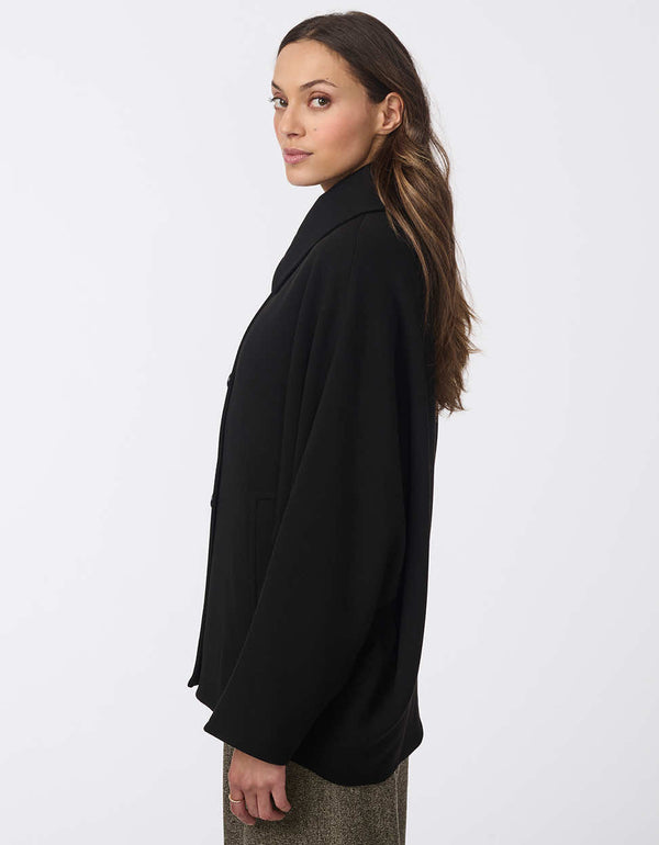 black wool coat for women made with batwing sleeves and oversized fit for maximum comfort and stylish design