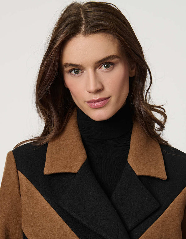 womens semi fitted calf length coat with bold chevron pattern in black and brown for a modern sophisticated look