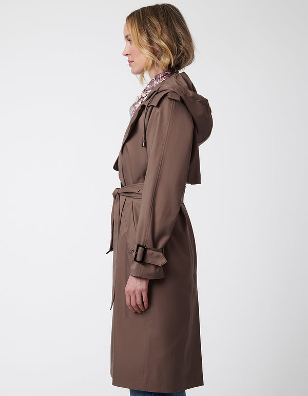 cross over between the traditional trench coat and the modern rain coat with adjustable sleeves and hood