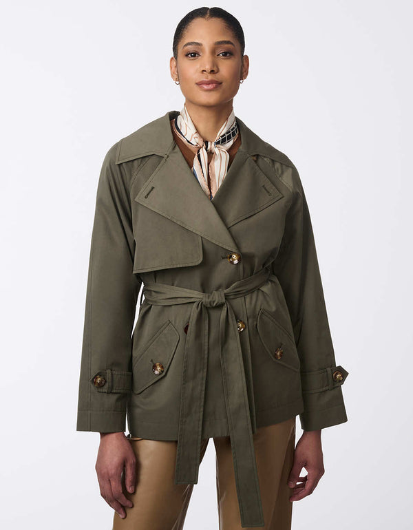 classic fitting trench coat for women featuring water-resistant fabric paired with a matching travel pouch in green