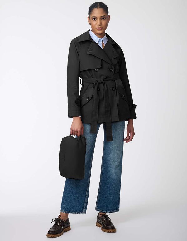 classic fitting trench coat for women featuring water-resistant fabric paired with a matching travel pouch in black