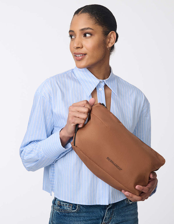 matching camel brown packable travel pouch for a water resistant belted trench coat for women