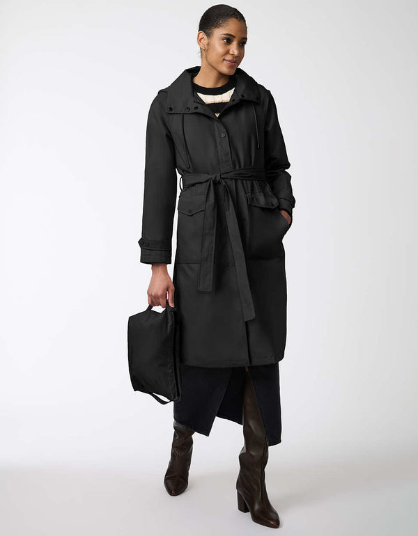 water resistant trench coat for women with an adjustable waist and removable hood in black