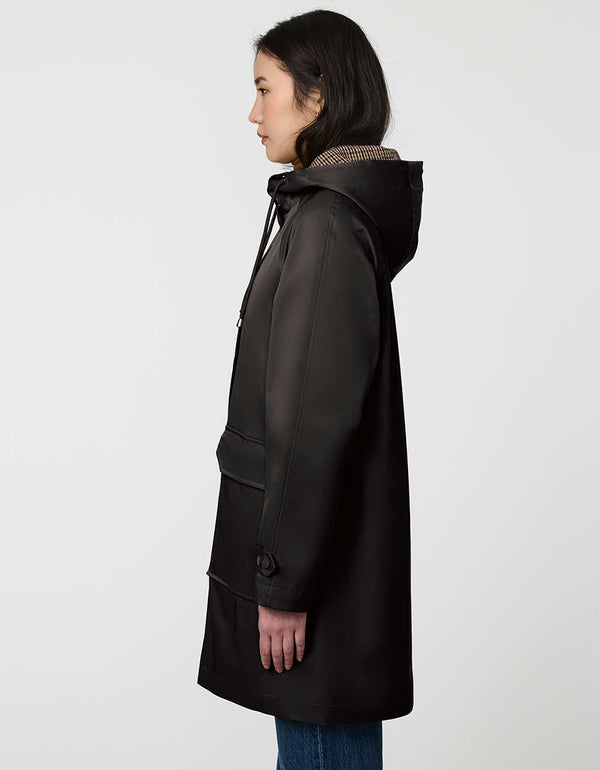 womens knee length black button up two pocket hooded rain coat made from recycled polyester