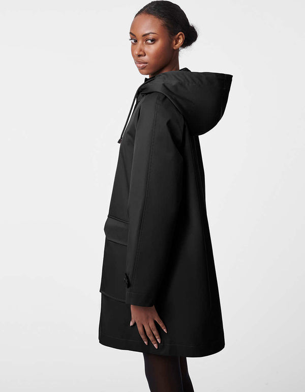 black water resistant rain coat made from recyclable polyester with structured sleeves and adjustable cuffs