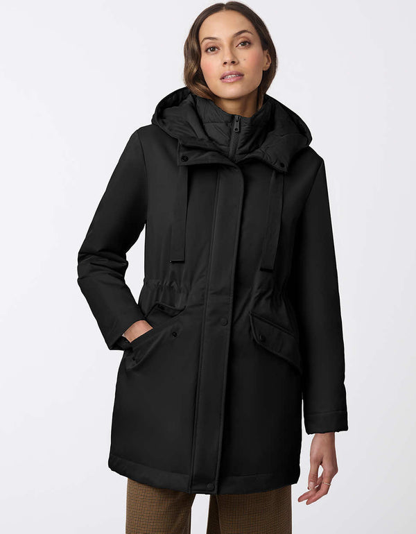 thigh length jacket for women made from water resistant recycled fabric a semi-fitted silhouette in black