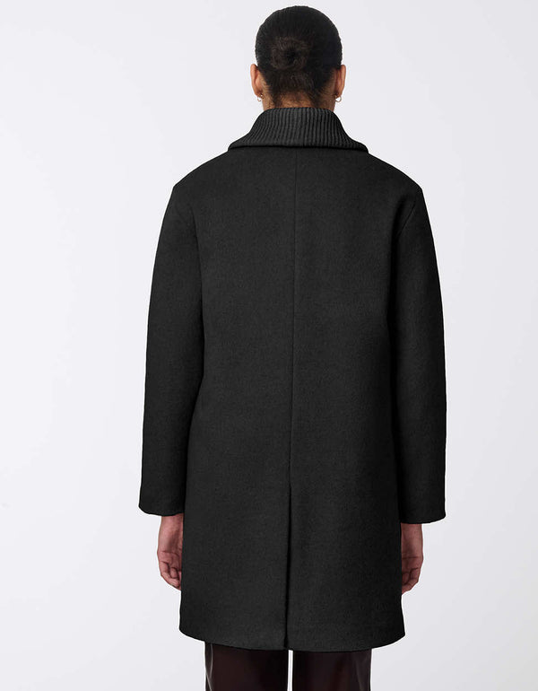 womens wool coat with classic fit and sleek zipper. Designed for ultimate comfort and elegance in cooler weather. Perfect for any occasion, blending warmth with minimalistic style