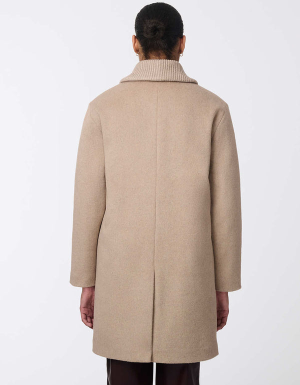 "womens wool coat with classic fit and sleek zipper. Designed for ultimate comfort and elegance in cooler weather. Perfect for any occasion, blending warmth with minimalistic style