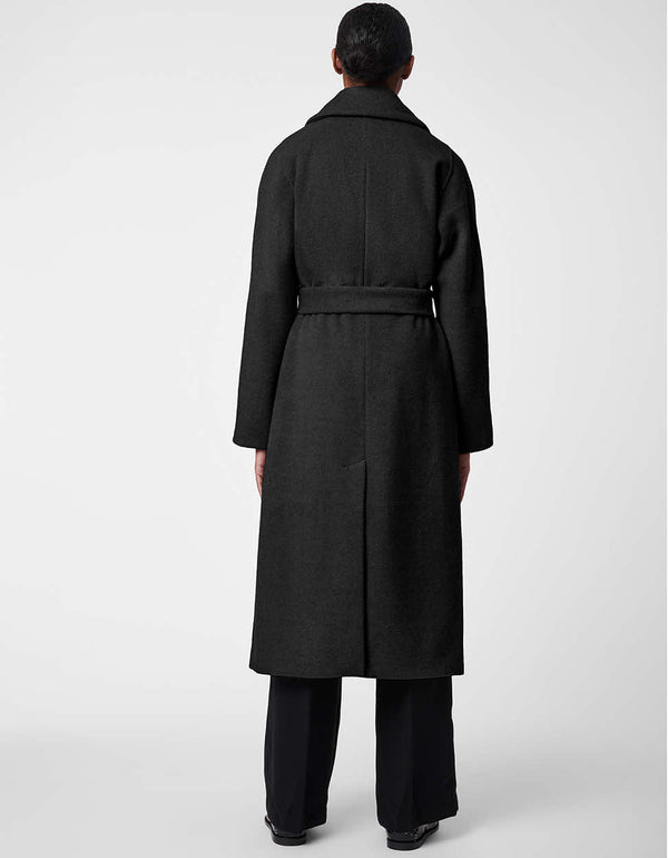 a black wool coat with belt and exaggerated statement sleeves that is ideal for any woman of any figure