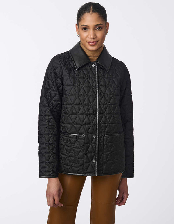 women's hip-length quilted jacket with faux leather trim. A sophisticated and effortless style for layering.