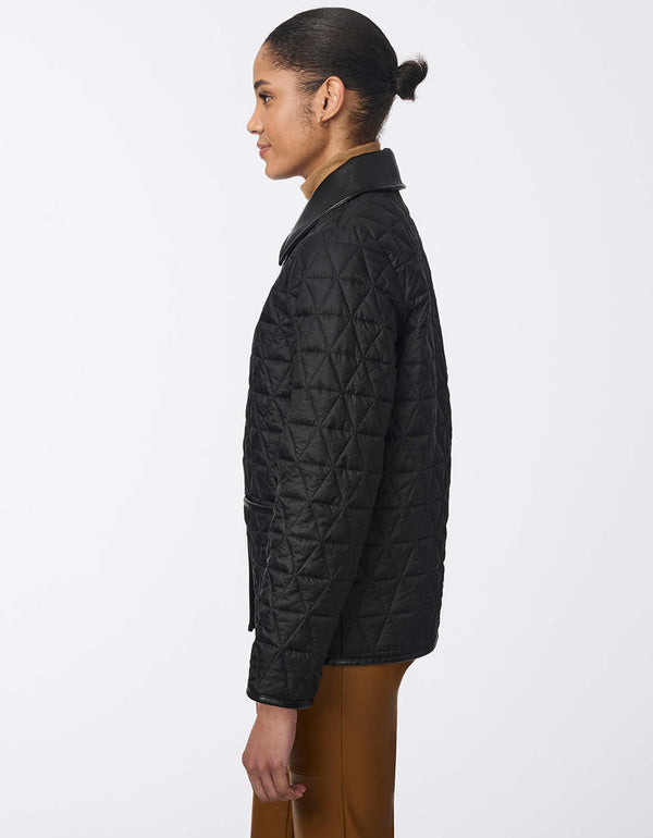 women's hip-length quilted jacket with faux leather trim. A sophisticated and effortless style for layering.