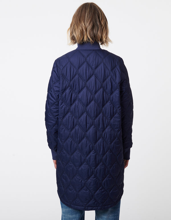 contemporary take on the classic puffer jacket for women made from recycled fabrics in navy blue