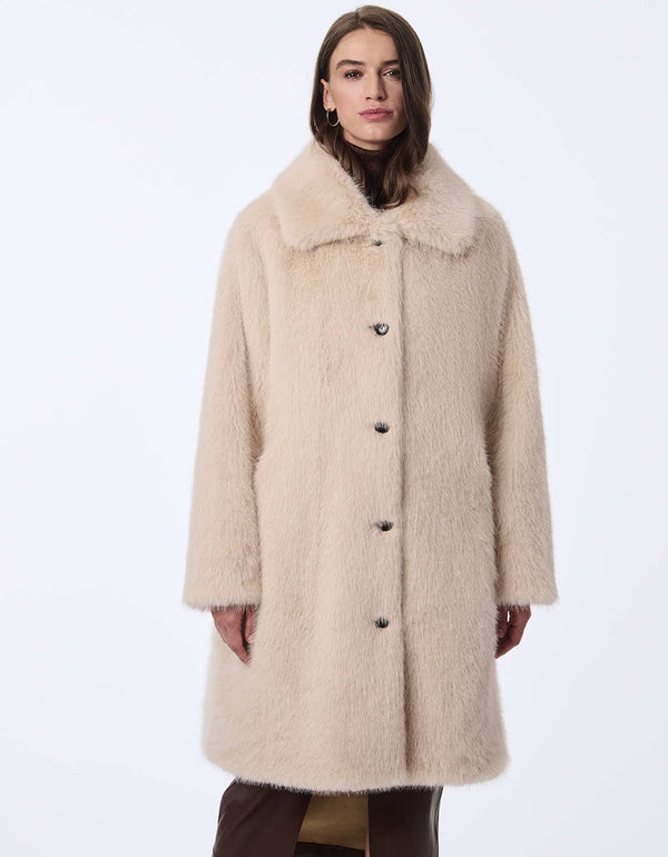 high fashion faux fur winter coat made with sustainable materials providing cozy style