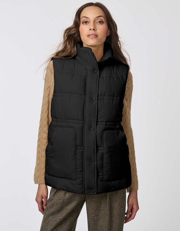 black warm puffer vest with large pockets for storage and sustainable insulation for women