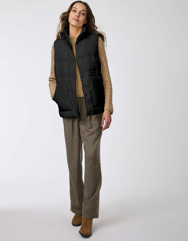 insulated and sustainable puffer vest in black for women perfect for layering during the colder months