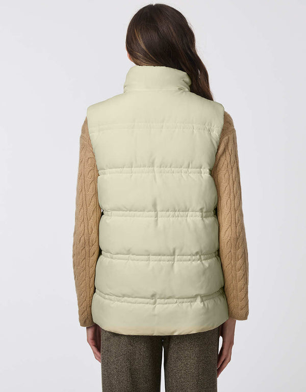 stylish and warm puffer vest with sustainable insulation and large pocketed buttons for women in light green color