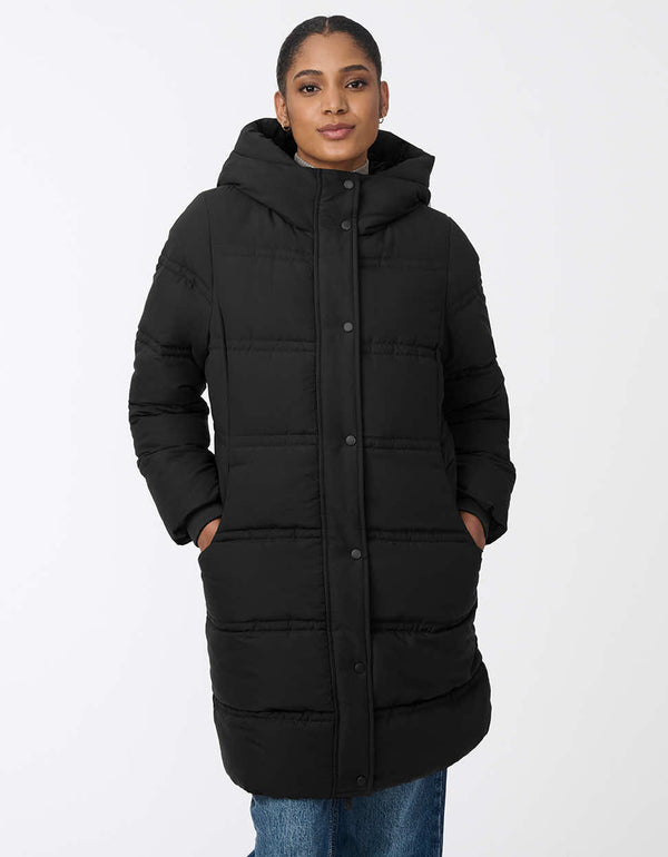 womens insulated puffer coat with hood and modern horizontal stitching. Made with recycled materials. Designed for winter comfort and sleek style.