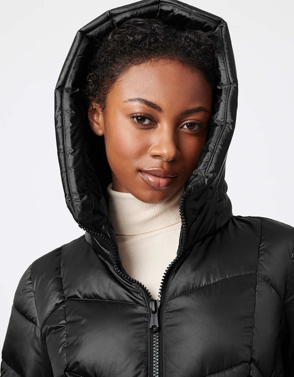 puffer jacket in shiny black with a large hood and high neckline for women made from recycled polyester