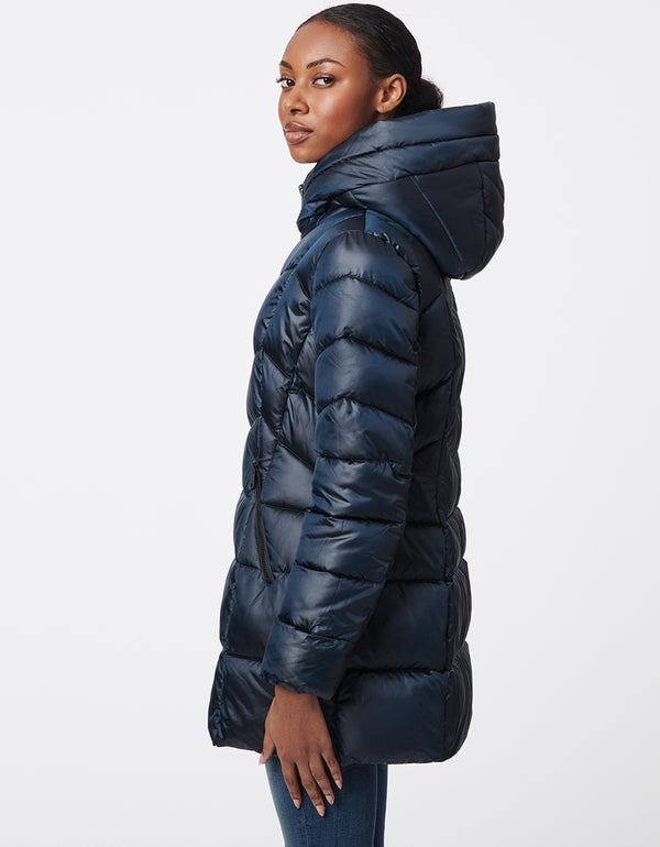 slim cut puffer jacket in blue for women with a layered hood and stitched detailing made for winter wear