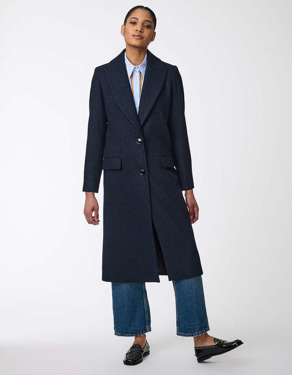 womens calf-length semi-fitted wool coat with classic design. Offers luxurious warmth and timeless style, perfect for any occasion. Combines elegance with comfort for refined outerwear.