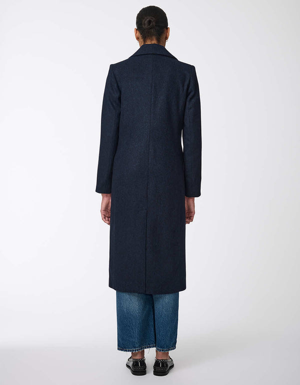 womens calf-length semi-fitted wool coat with classic design. Offers luxurious warmth and timeless style, perfect for any occasion. Combines elegance with comfort for refined outerwear.