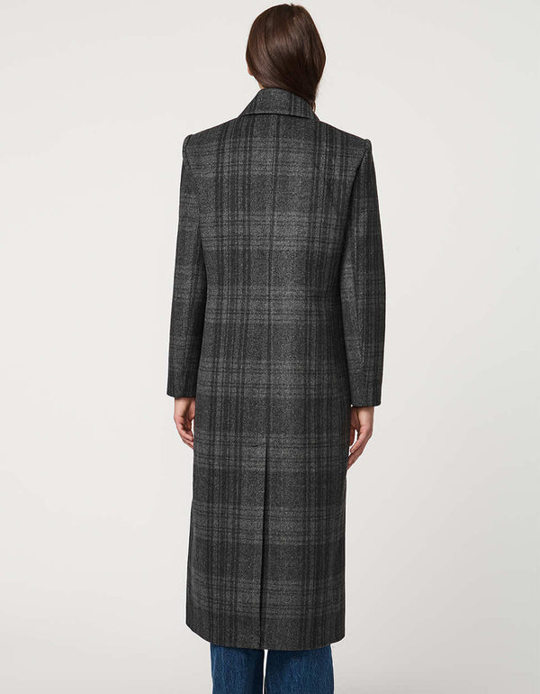 Women’s calf-length wool coat with double-breasted front and oversized lapels for modern tailored style.