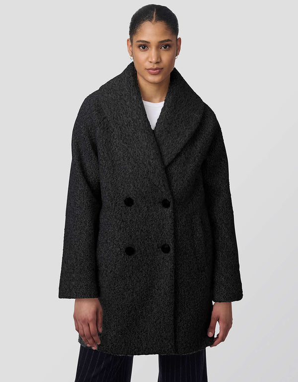 womens thigh-length oversized wool coat with fuzzy fabric and double-breasted design. Offers luxurious warmth and functionality, ideal for outdoor adventures with chic style.