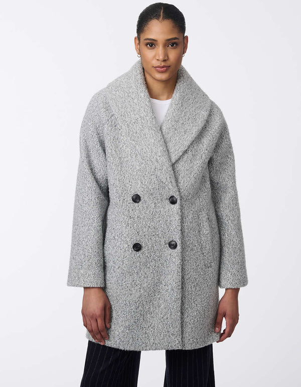 stylish and comfortable oversized double breasted wool coat with black button detailing and two pockets for women