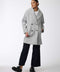 luxurious and functional double breasted and oversized heather grey wool coat for women with black buttons