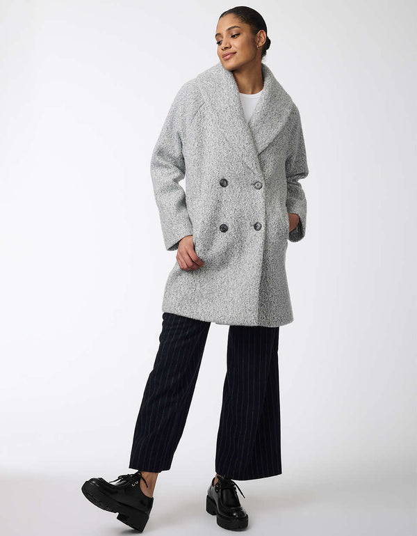 luxurious and functional double breasted and oversized heather grey wool coat for women with black buttons