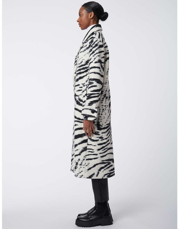 zebra print coat jacket for women made with recycled fabrics perfect as a statement piece for the winter season