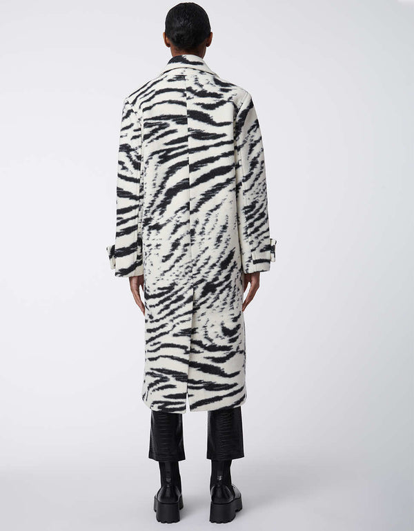 relaxed fitting zebra print coat for women with a single slit in the back for flexibility in the winter