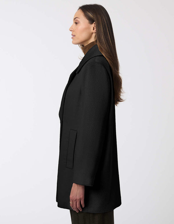 two pocket elegant and classy double buttoned wool coat for women seamlessly transitions from day to night