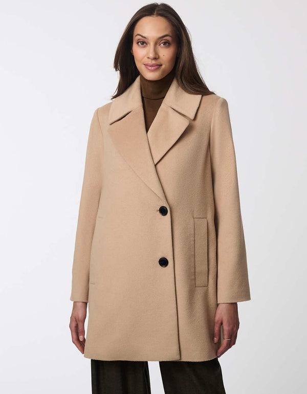 contemporary and sleek double buttoned brown jacket for women with an oversized fit and two pockets