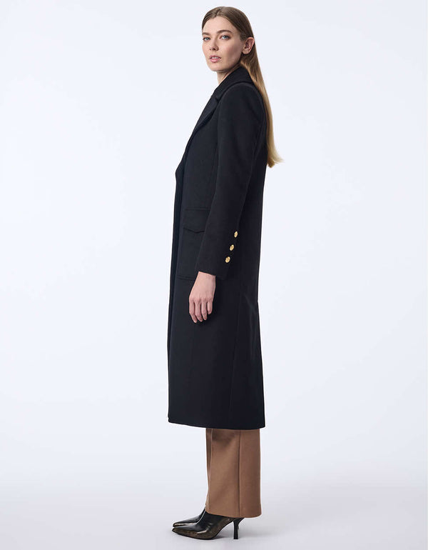 womens black wool coat with semi fitted design ideal for pairing with streetwear or high fashion looks