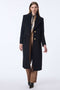 classic black wool coat with calf length cut and patch pockets ideal for adding sophistication to everyday outfits