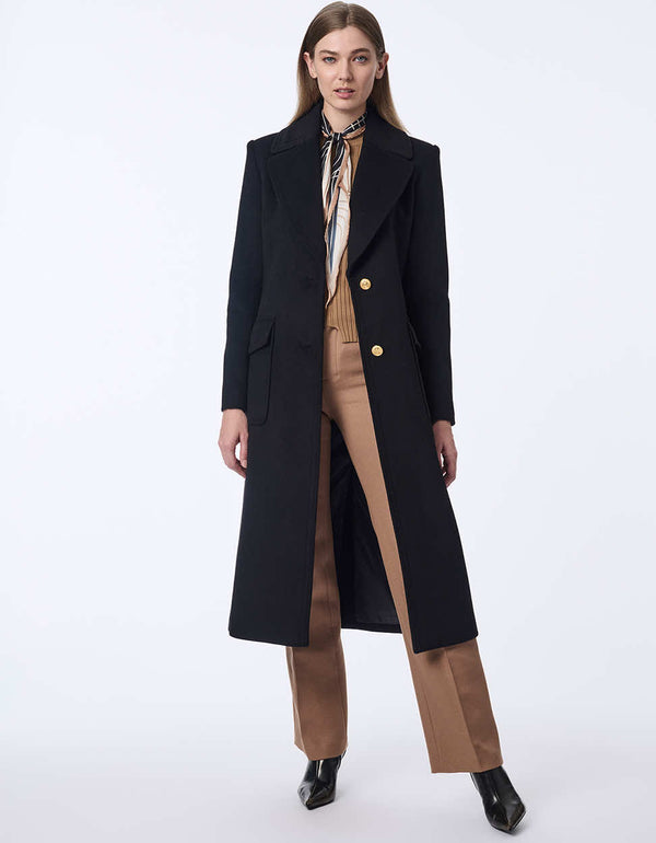 women's tailored wool coat with a sophisticated and stylish design. Patch pockets and large lapels make it a statement coat.