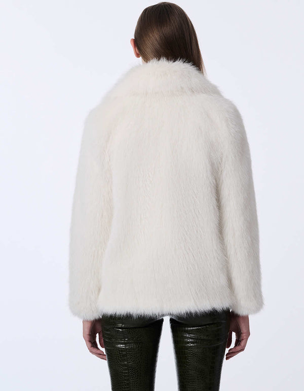 women's hip-length faux fur jacket with large lapels. Statement style for day or night.