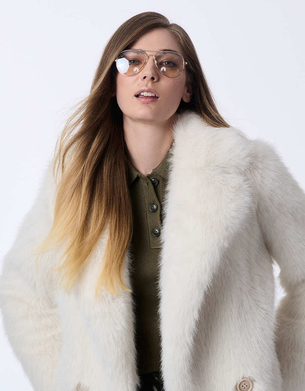 women's hip-length faux fur jacket with large lapels. Statement style for day or night.