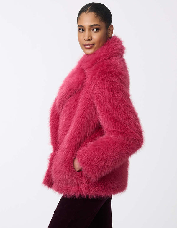 womens pink faux fur jacket with modern lapels and a tailored fit creating a statement worthy piece