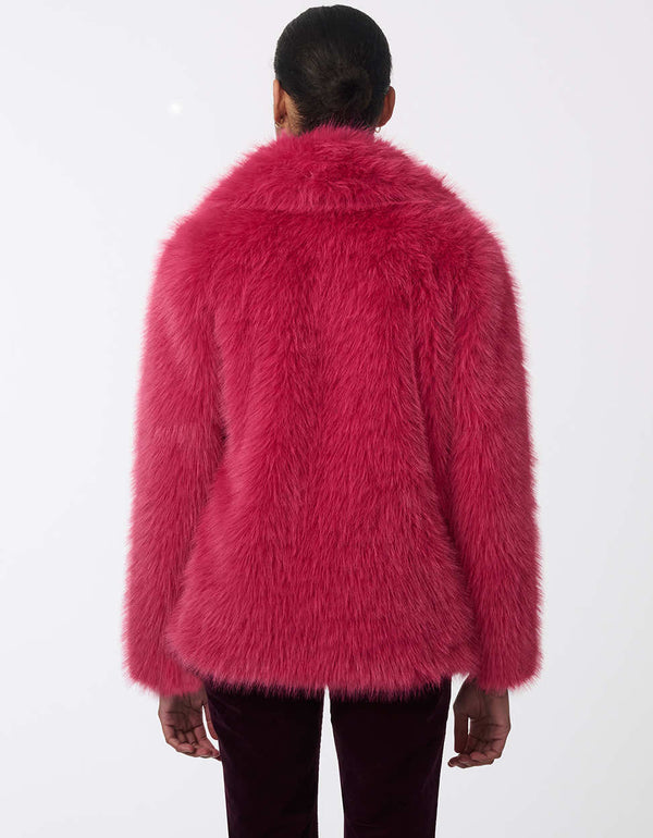 women's hip-length faux fur jacket with large lapels. Statement style for day or night.