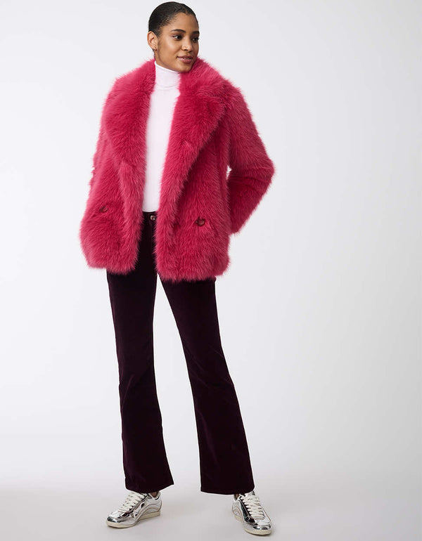 women's hip-length faux fur jacket with large lapels. Statement style for day or night.