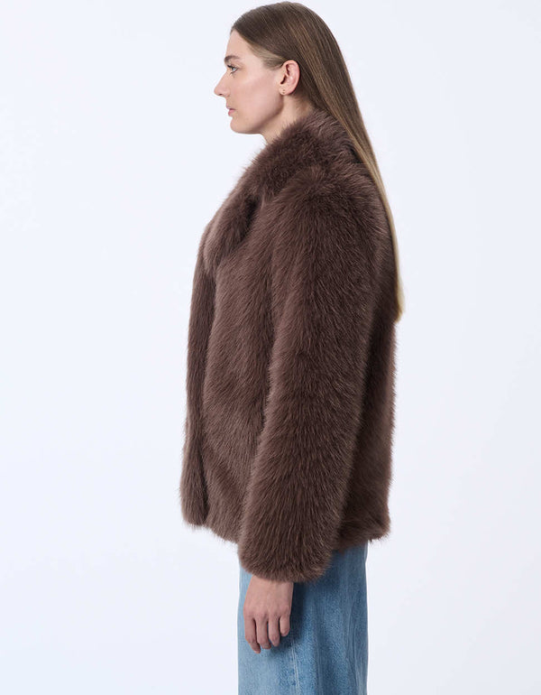 soft taupe jacket in plush faux fur with a tailored shape ideal for sophisticated outerwear