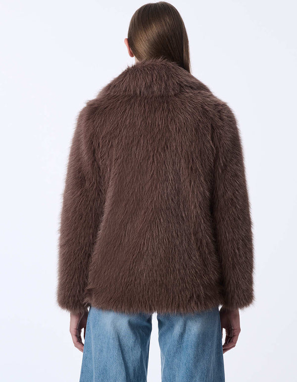 women's hip-length faux fur jacket with large lapels. Statement style for day or night.