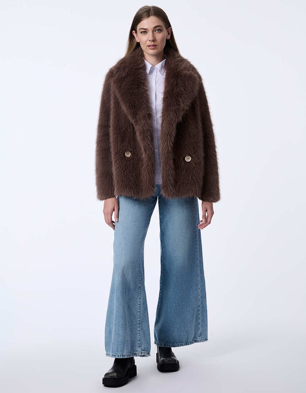 women's hip-length faux fur jacket with large lapels. Statement style for day or night.