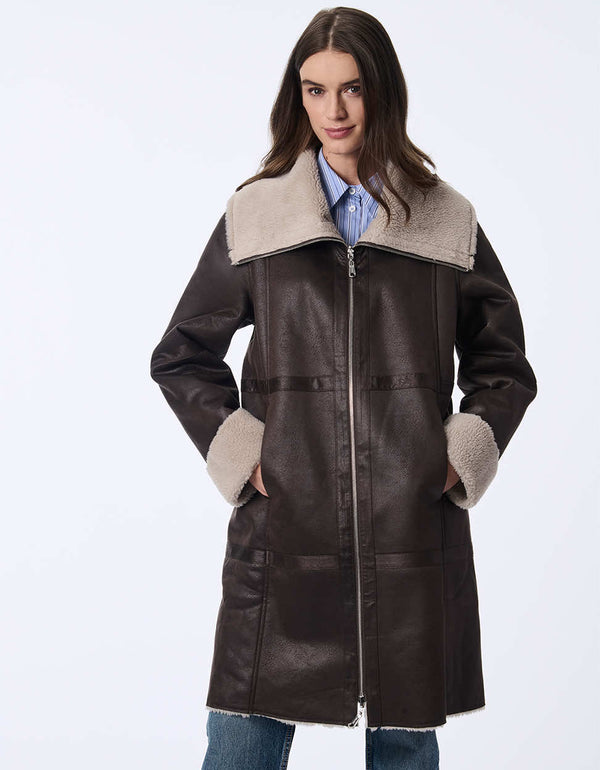 womens teddy and faux leather reversable coat. Cozy effortless style with a two-in-one design.