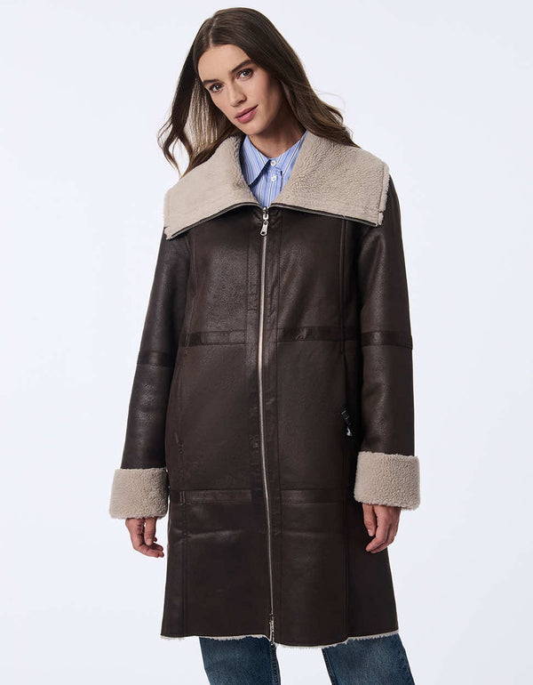 womens teddy and faux leather reversable coat. Cozy effortless style with a two-in-one design.