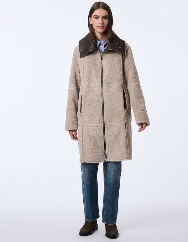 womens teddy and faux leather reversable coat. Cozy effortless style with a two-in-one design.